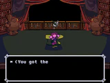 Susie holding the JusticeAxe aloft